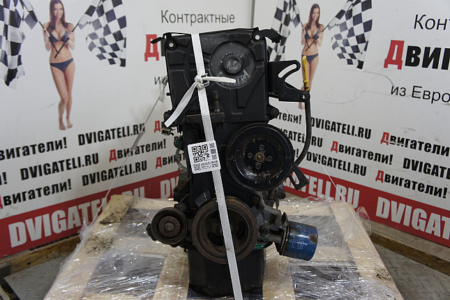 Двигатель вид с боку Hyundai G4ED-G