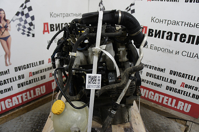 Двигатель вид с боку Opel X 10 XE