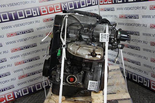 Двигатель вид с боку SUZUKI G10A 