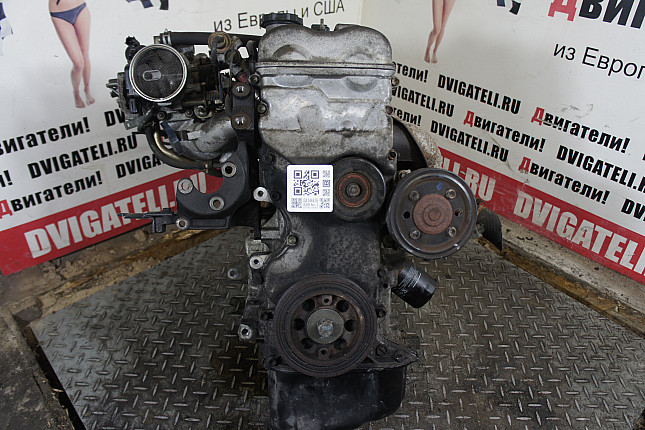 Двигатель вид с боку Suzuki J18A