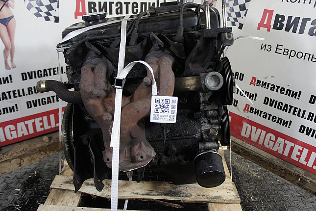 Двигатель вид с боку Hyundai G4DJ