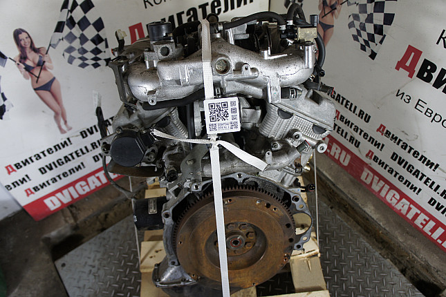 Двигатель вид с боку Suzuki H 25 A