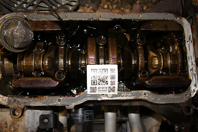 Фотография блока двигателя без поддона (коленвала) NISSAN QG18DE