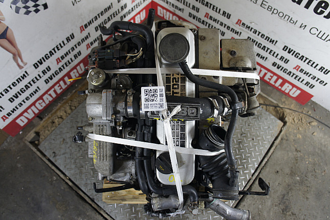 Фотография контрактного двигателя сверху Nissan TD27T