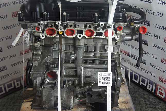 Двигатель вид с боку KIA G4FC