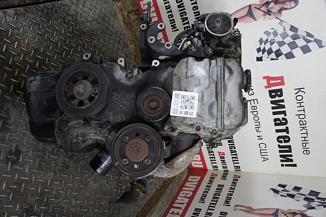 Двигатель вид с боку Suzuki J18A